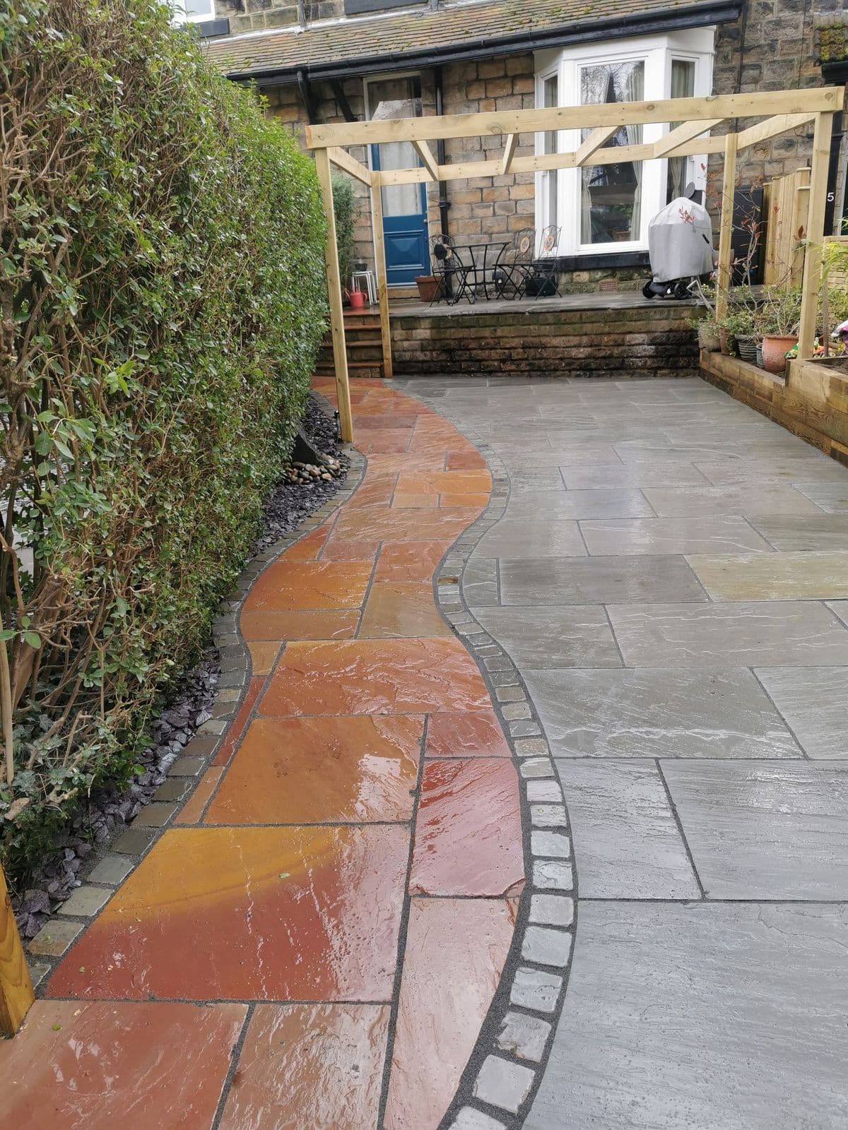 The Modak path running from the new gate up to the house, edged in tumbled setts