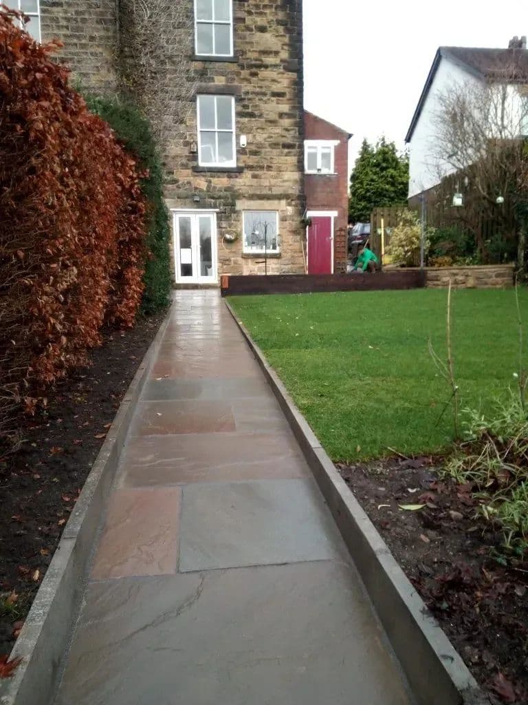 The new path running from the main road down to the nursery entrance, edged in timber