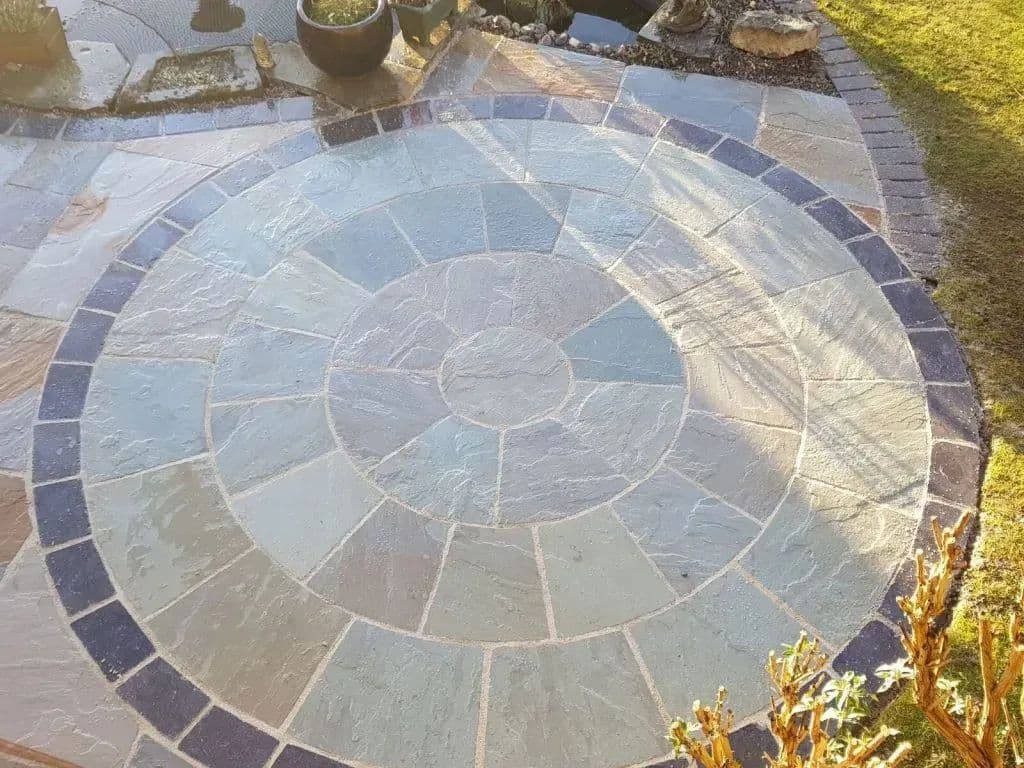 The three-ring promenade stone circle at the centre of the new patio