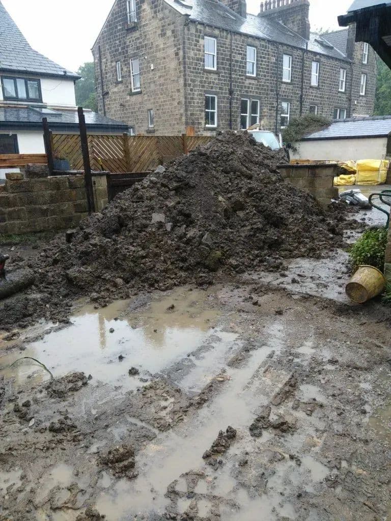 Standing water across the site after another day of rain